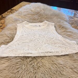Lululemon All yours crop tank veil. White color size 8 no tags. Like new!